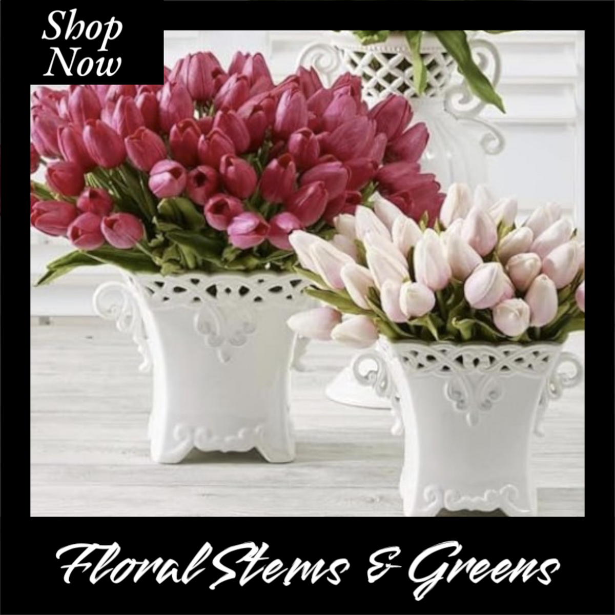 A bouquet of red and pink artificial tulips with green stems and leaves, arranged in elegant white vases, creating a lifelike floral arrangement.