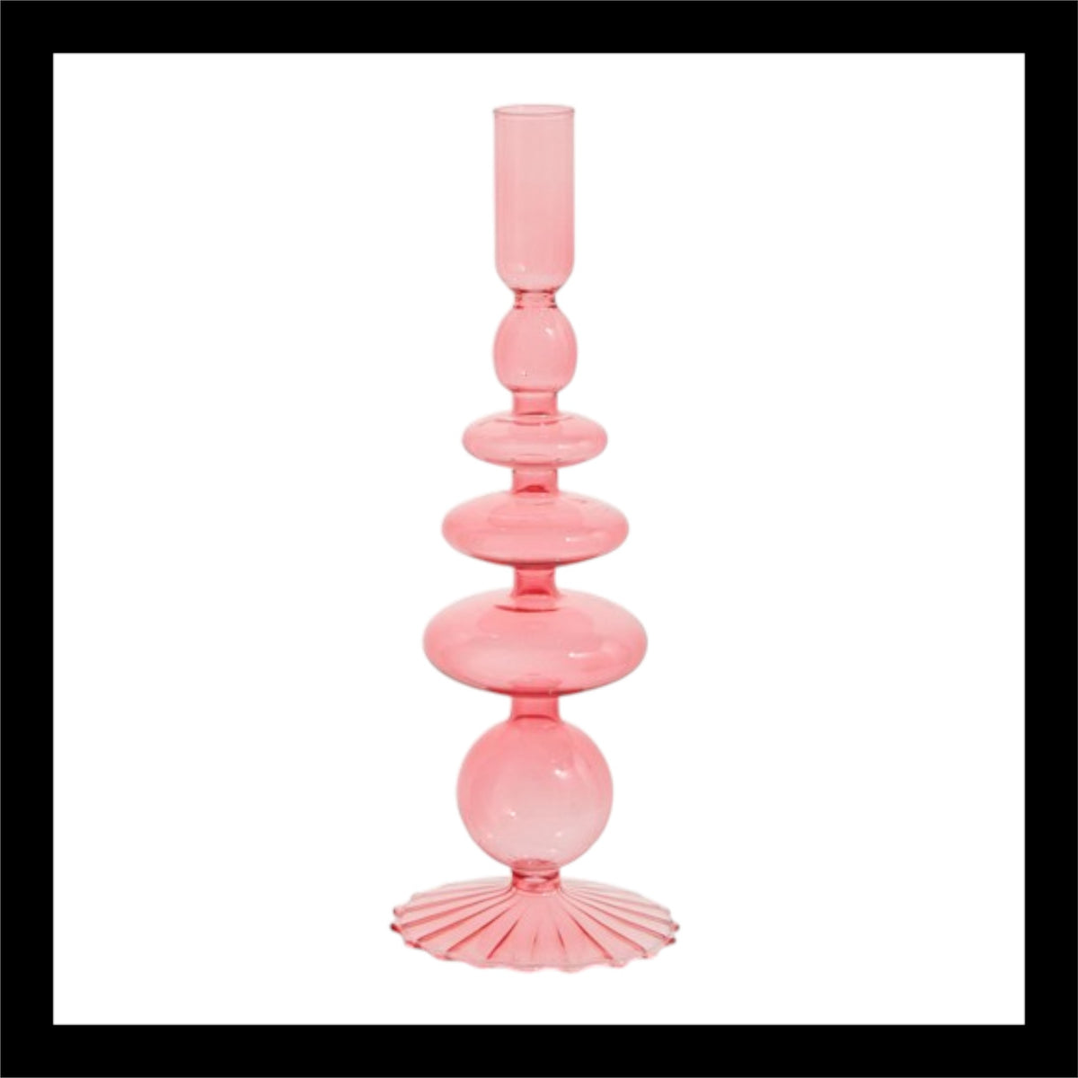 Elegant pink glass candlestick with a stacked, sculptural design, ideal for holding taper candles. Measures 3.5" D x 10.25" H for a stylish addition to any setting.