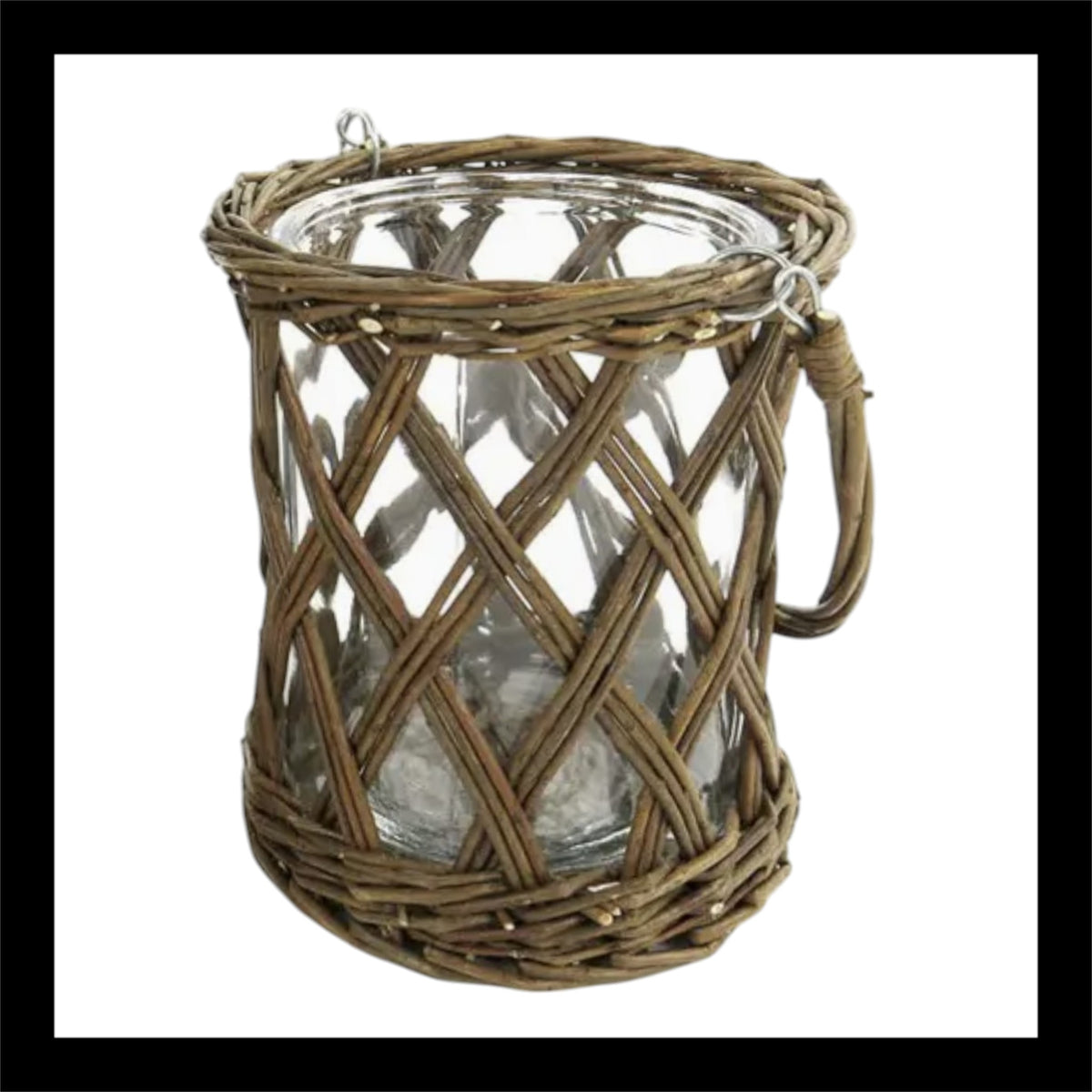 A beautifully crafted rustic woven willow vase featuring a sturdy glass insert and an intricate crisscross wicker design. This charming home décor piece measures 7.5 inches in diameter and 9 inches in height, perfect for displaying flowers or candles.
