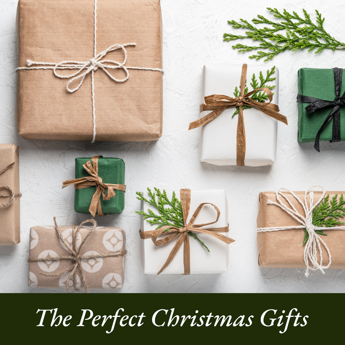 Assorted beautifully wrapped Christmas gifts in neutral and green tones with twine and greenery — The Perfect Christmas Gifts Collection by Paisley Candle & Home