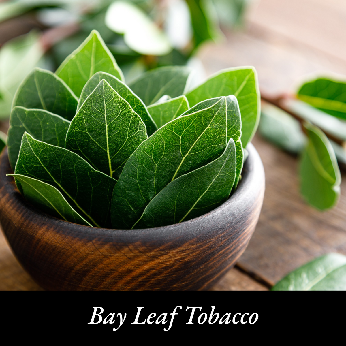 Bay leaf tobacco in a wooden bowl on a wooden surface