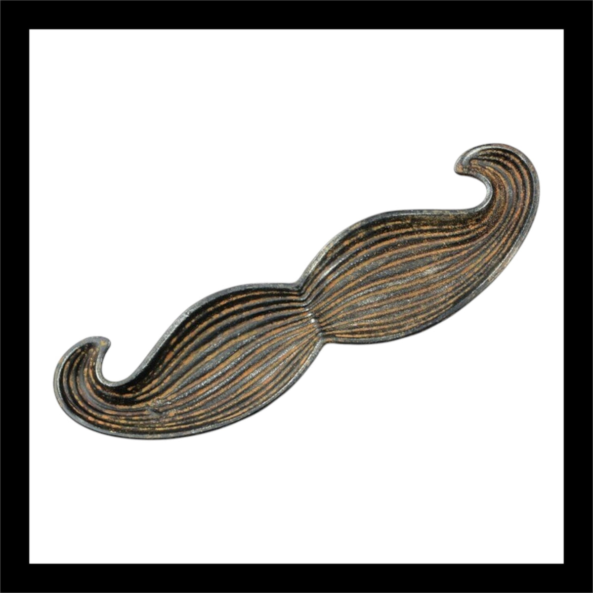 A vintage-style cast iron mustache tray with a rustic finish. Designed with curved, textured details to resemble a classic handlebar mustache. Perfect for holding keys, coins, or small trinkets. Measures 11.75" L x 3.25" W x 1" H.