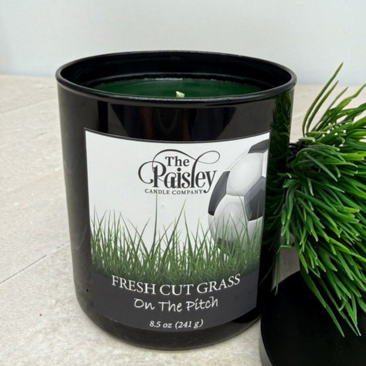 On the Pitch Fresh Cut Grass Candle by The Paisley Candle Company inspired by soccer fields and fresh cut grass.